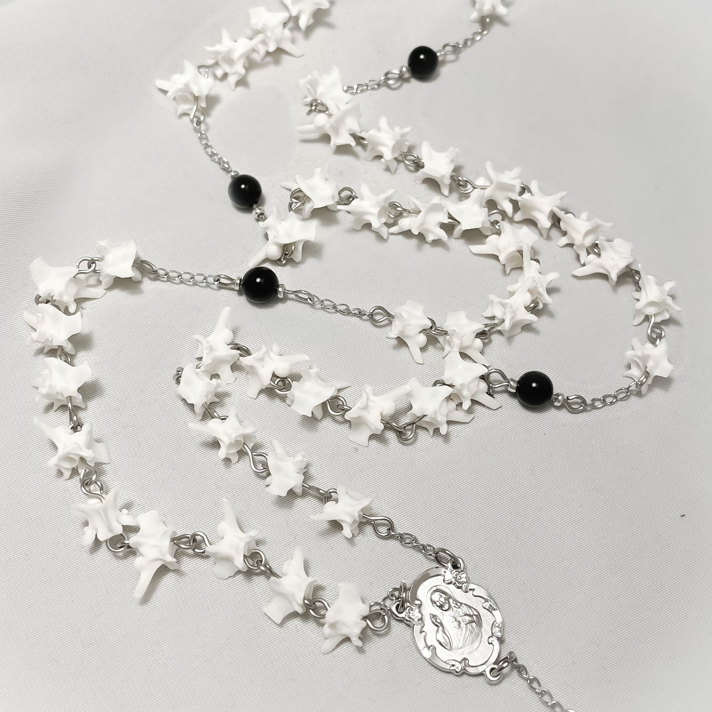 Bone Rosary w/ black onyx beads