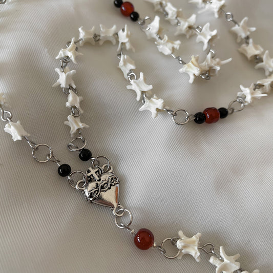 Sacred heart bone rosary w/ black onyx pendant