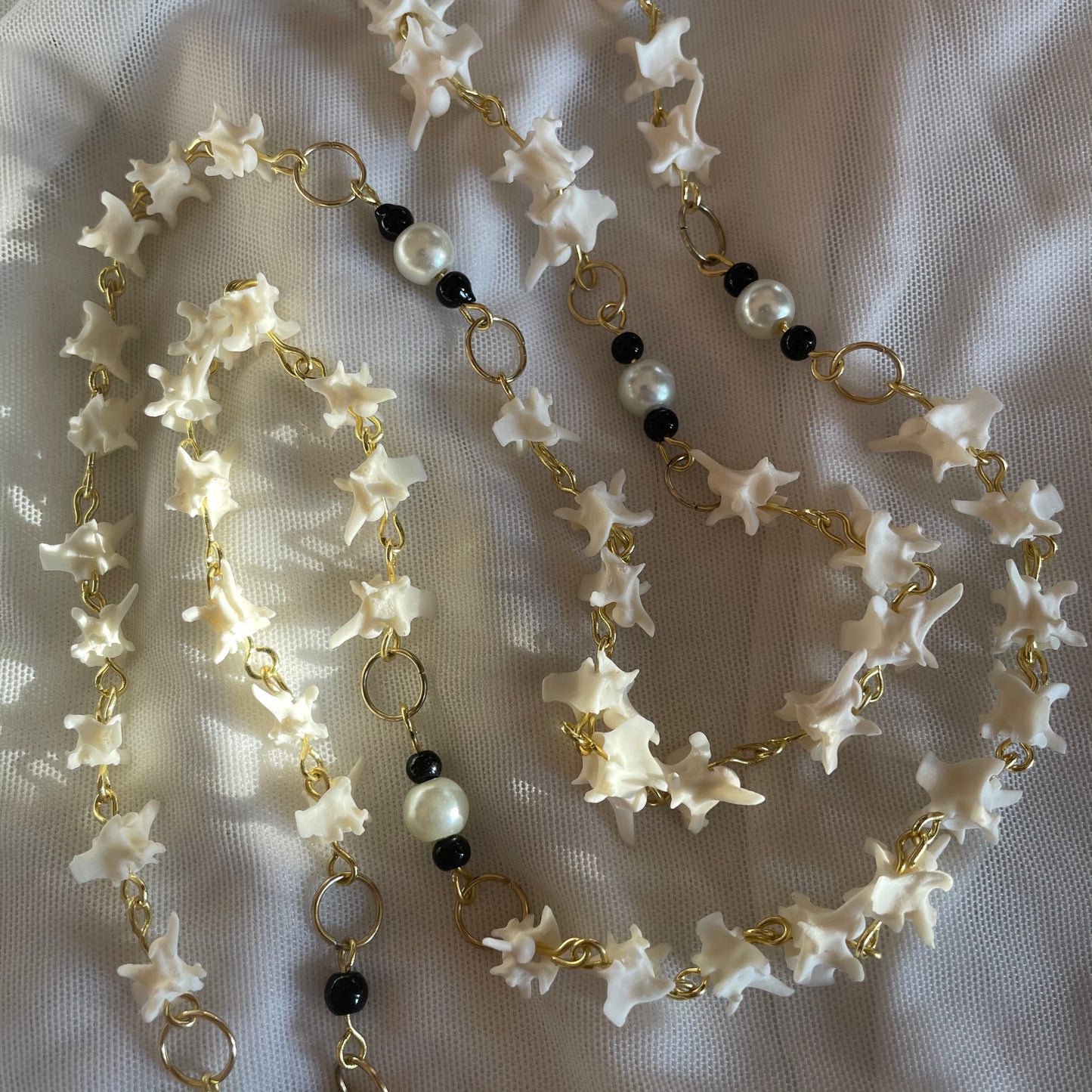 Golden heart bone rosary