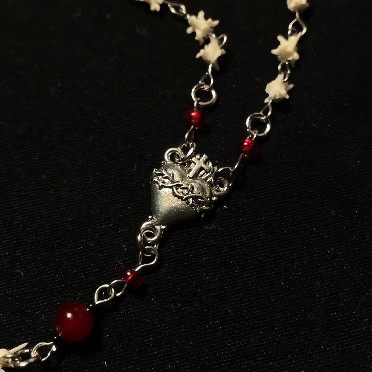 Bleeding heart bone rosary