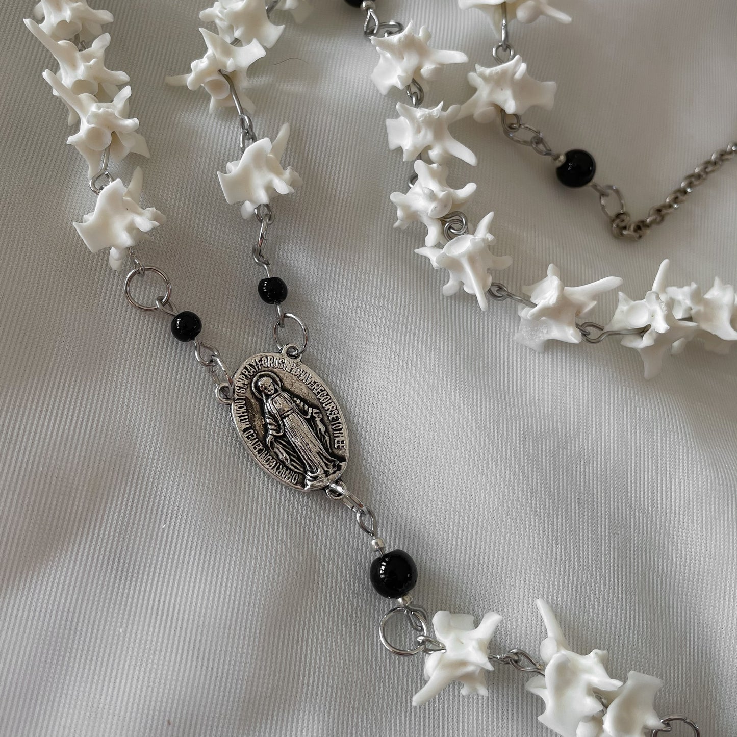 Bone rosary w/ black onyx