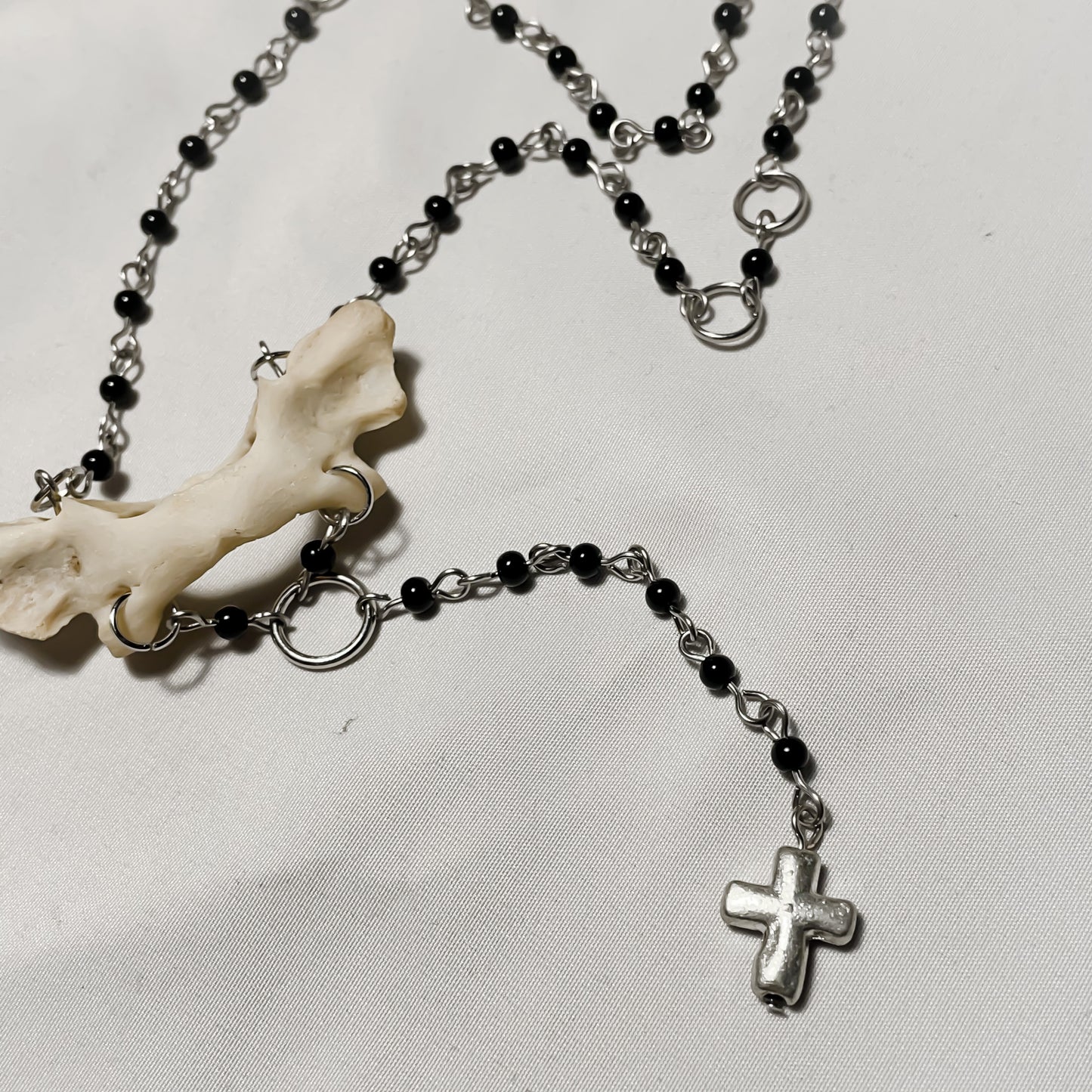 Raccoon atlas necklace w/ cross