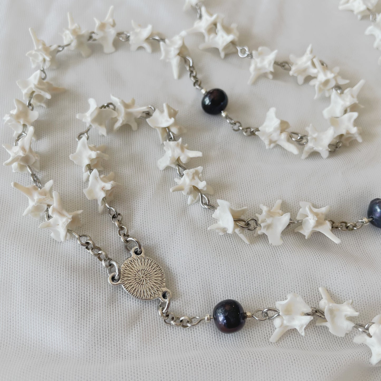 Bone rosary w/ locket