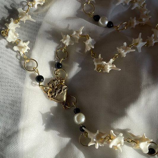 Golden heart bone rosary