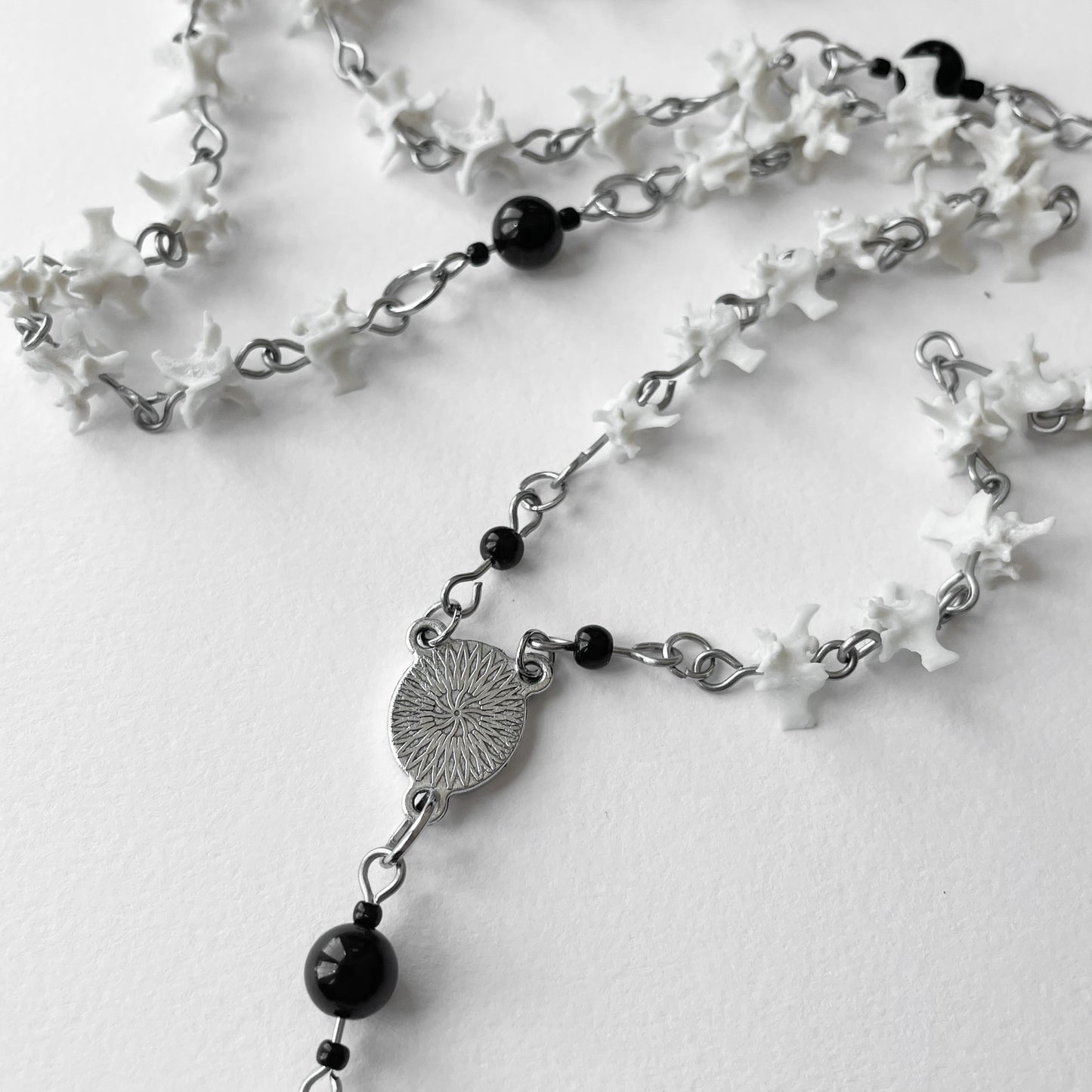 Bone rosary w/ locket