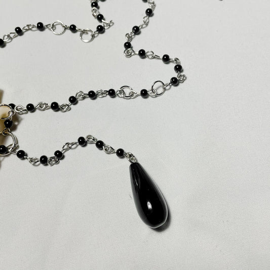 Raccoon atlas necklace w/ onyx crystal