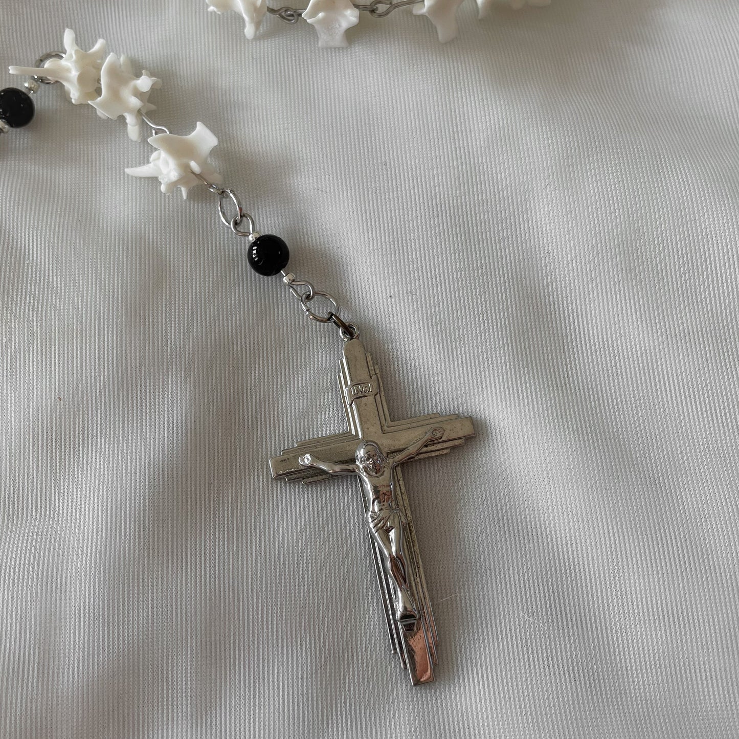 Bone rosary w/ black onyx