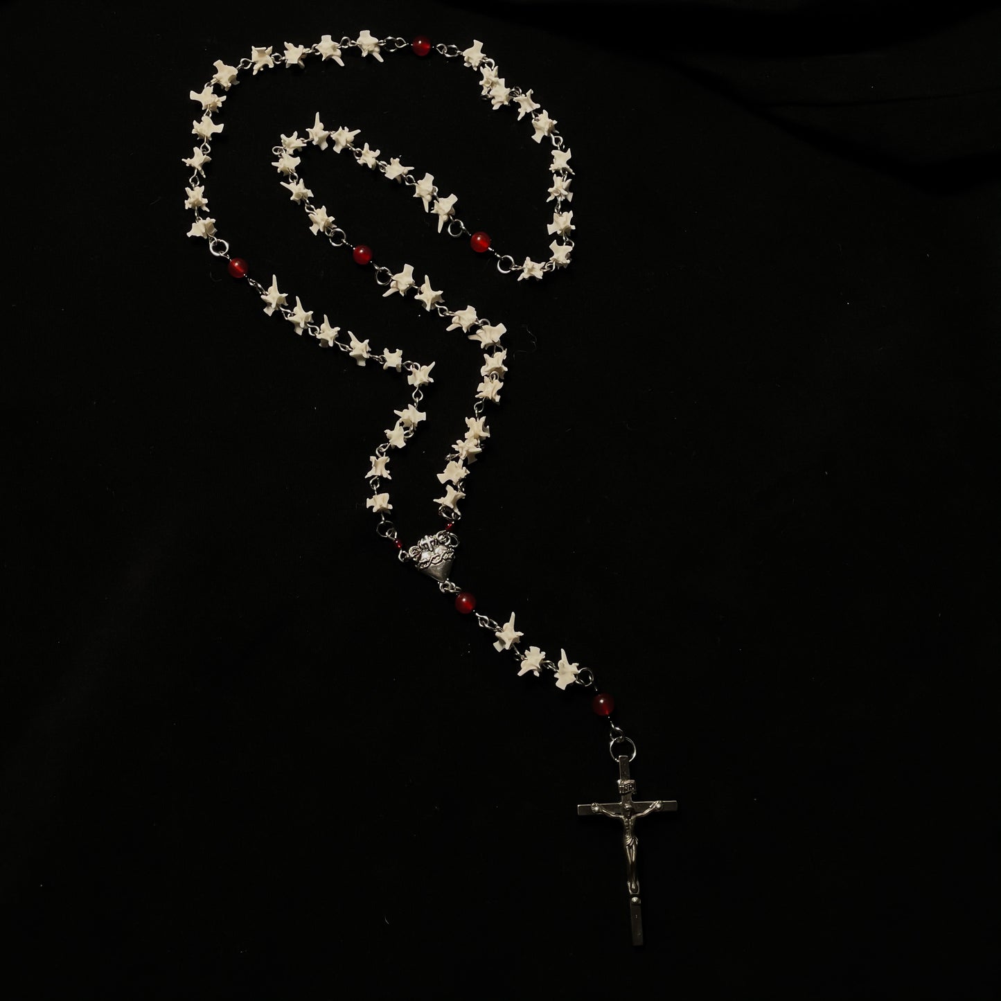 Bleeding heart bone rosary