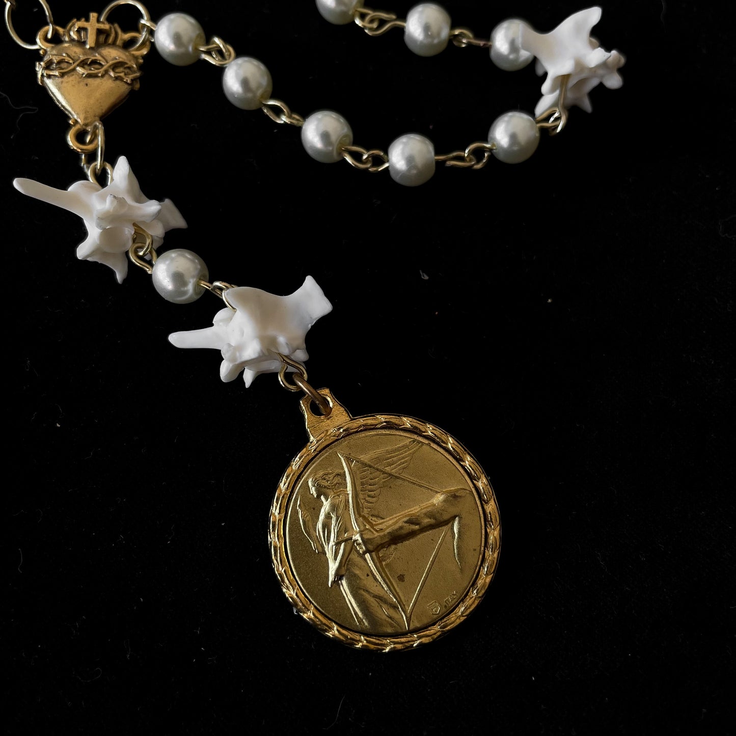 Golden archer necklace