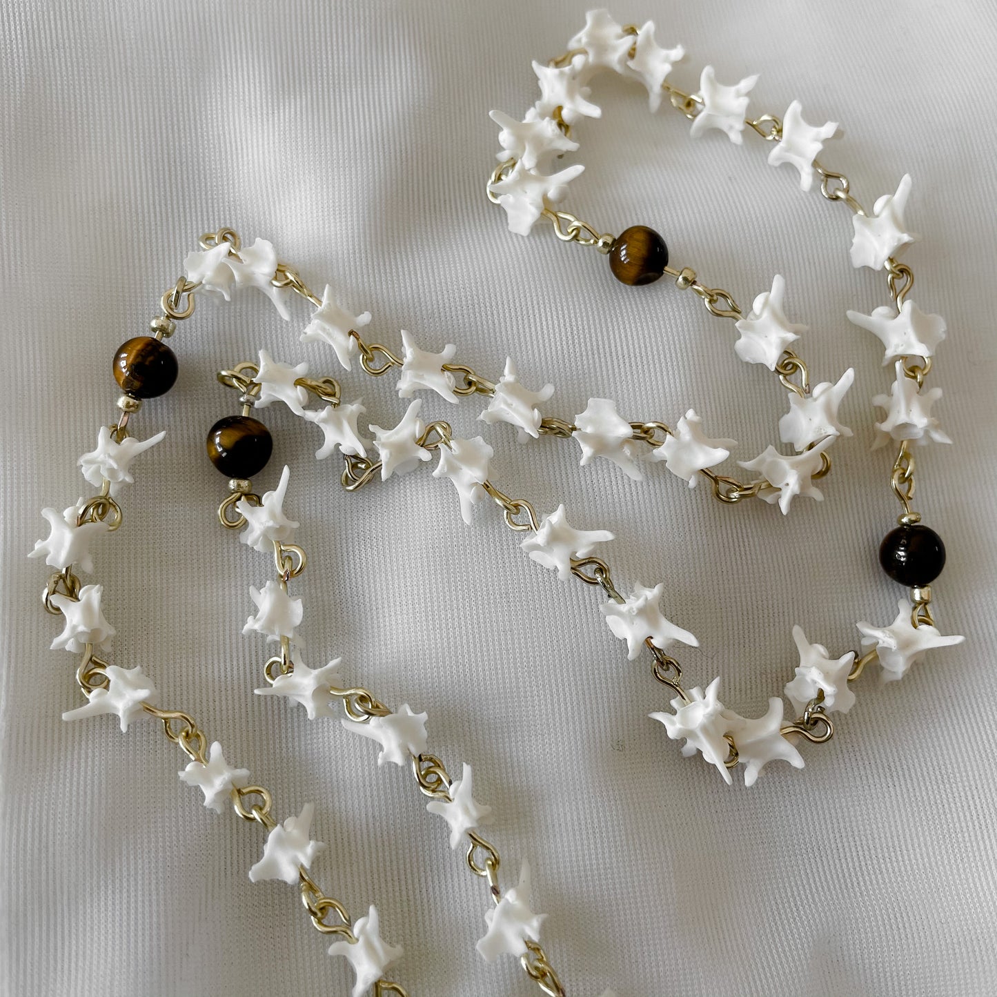 Bone rosary w/ tigers eye