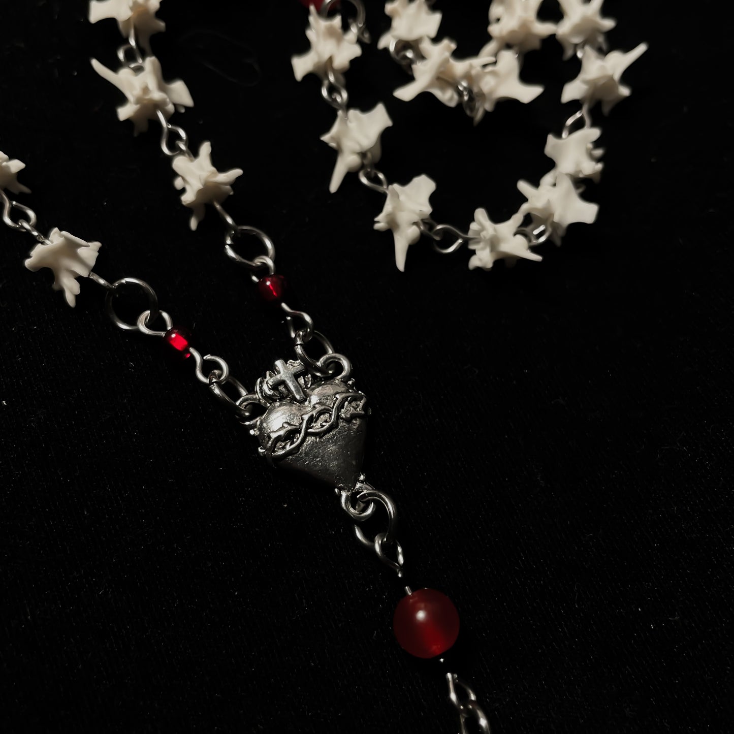 Bleeding heart bone rosary