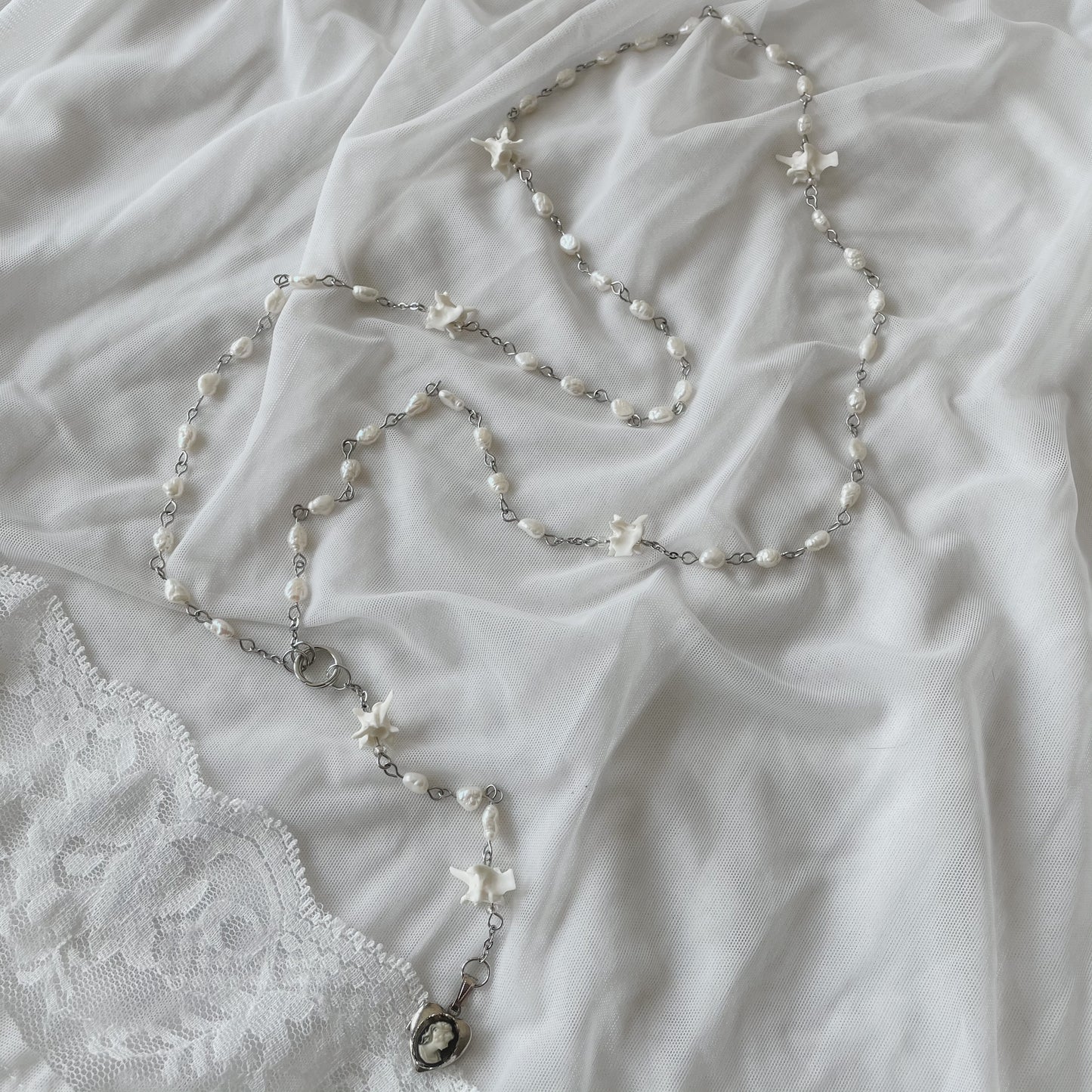 Freshwater pearl bone rosary w/ antique cameo