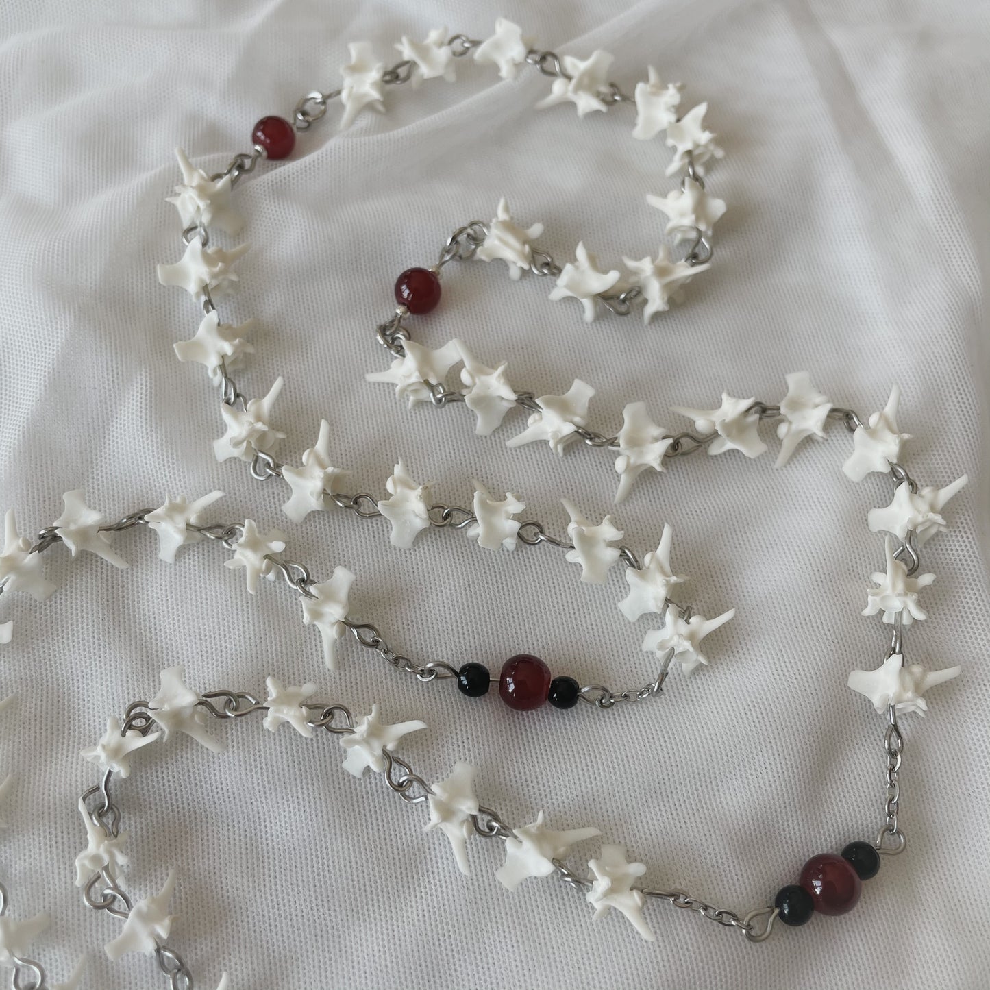 Bleeding heart bone rosary