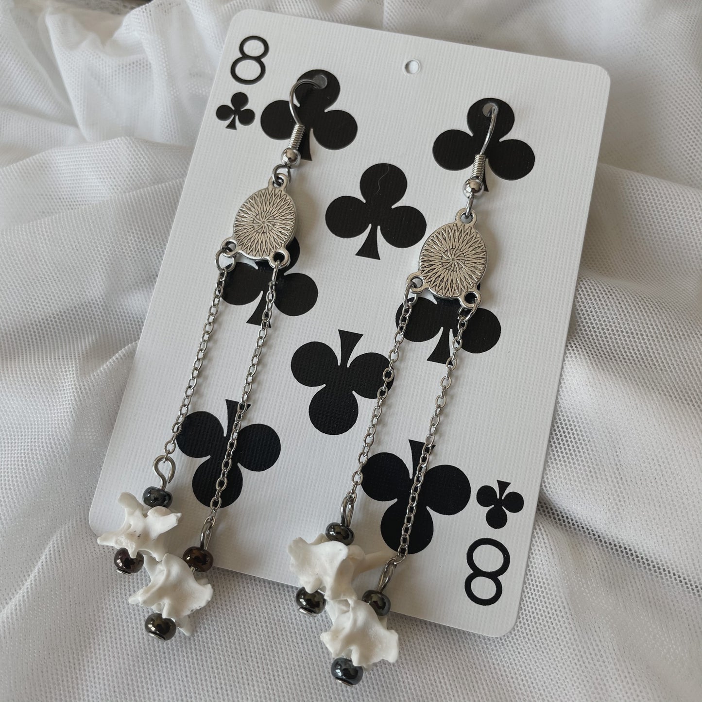 Twin bone earrings—black