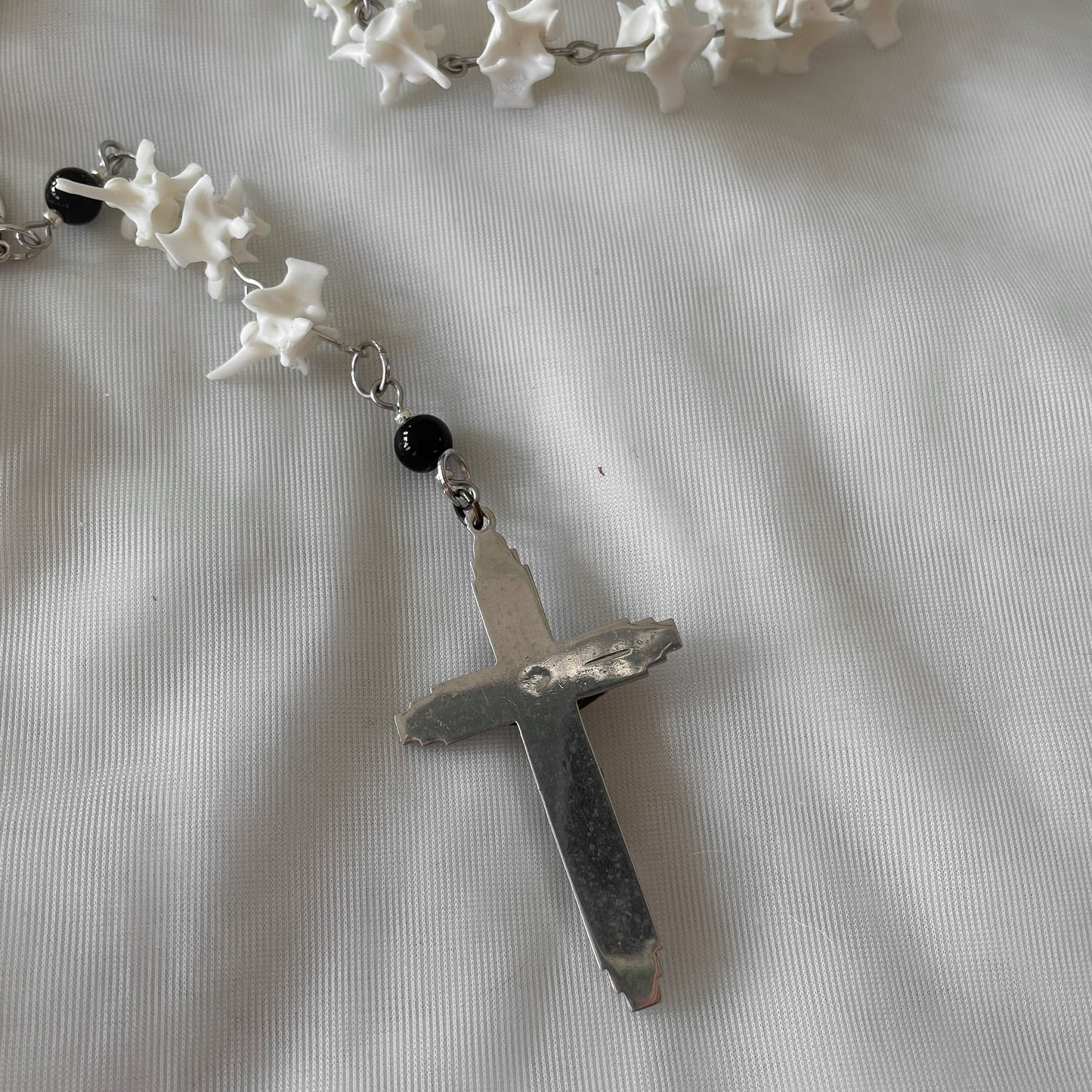 Bone rosary w/ black onyx