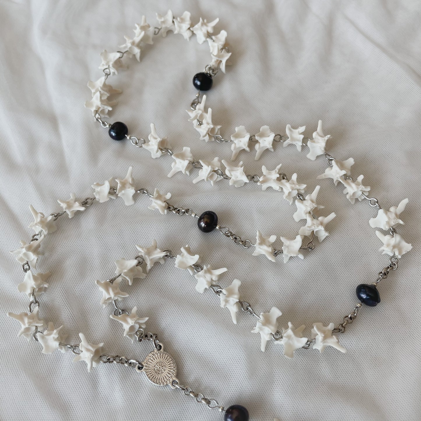 Bone rosary w/ locket