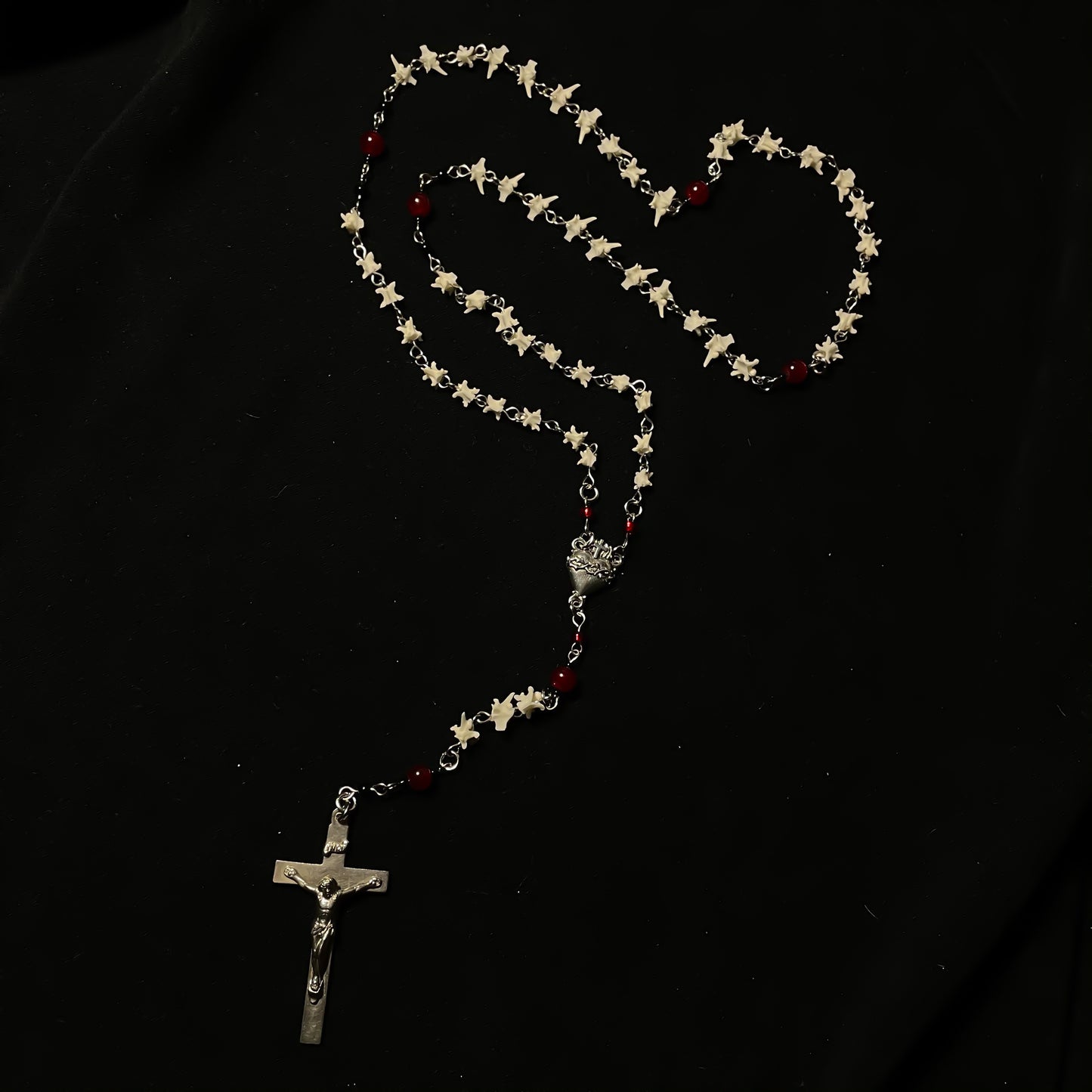 Bleeding heart bone rosary