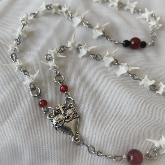 Bleeding heart bone rosary