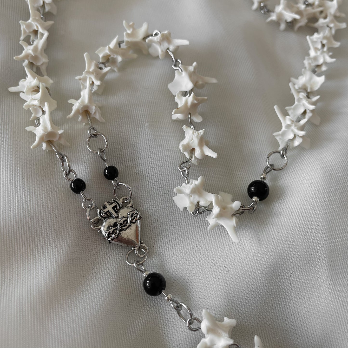 Sacred heart bone rosary w/ black onyx